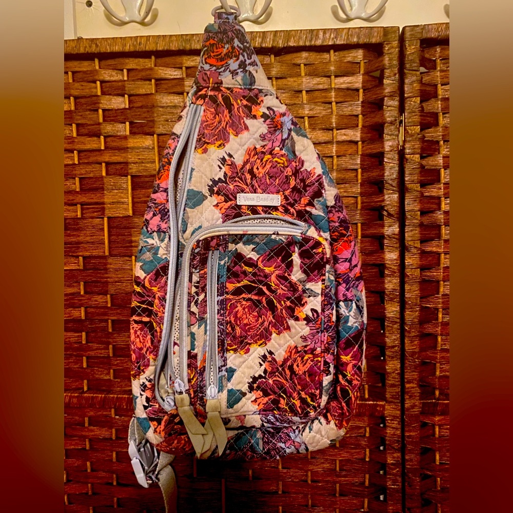 Vera Bradley sling backpack. Neon Blooms pattern.